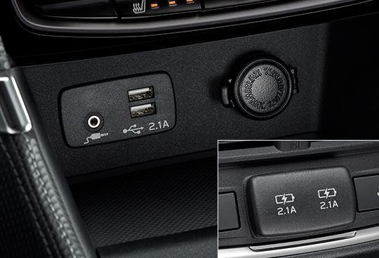 <sg-lang1>Puertos de USB y audio auxiliar</sg-lang1><sg-lang2></sg-lang2><sg-lang3></sg-lang3>